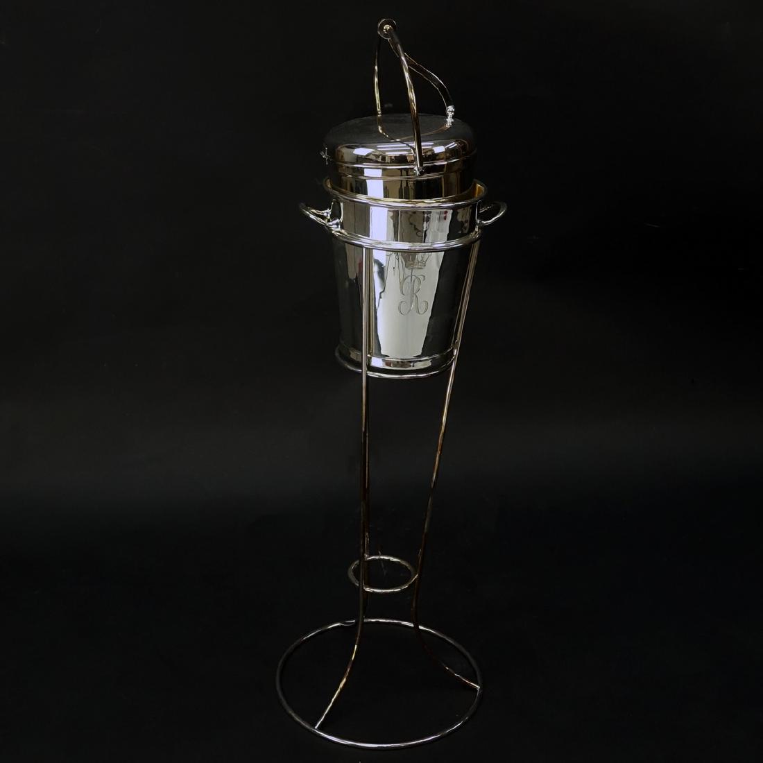 Vintage Silver Plate Standing Wine Bucket and Ice: Vintage Silver Plate Standing Wine Bucket and Ice Bucket. Standing bucket marked Made In England. Good condition with light wear. Standing bucket measures 28-3/4" H. Shipping: Third party. (estimate $