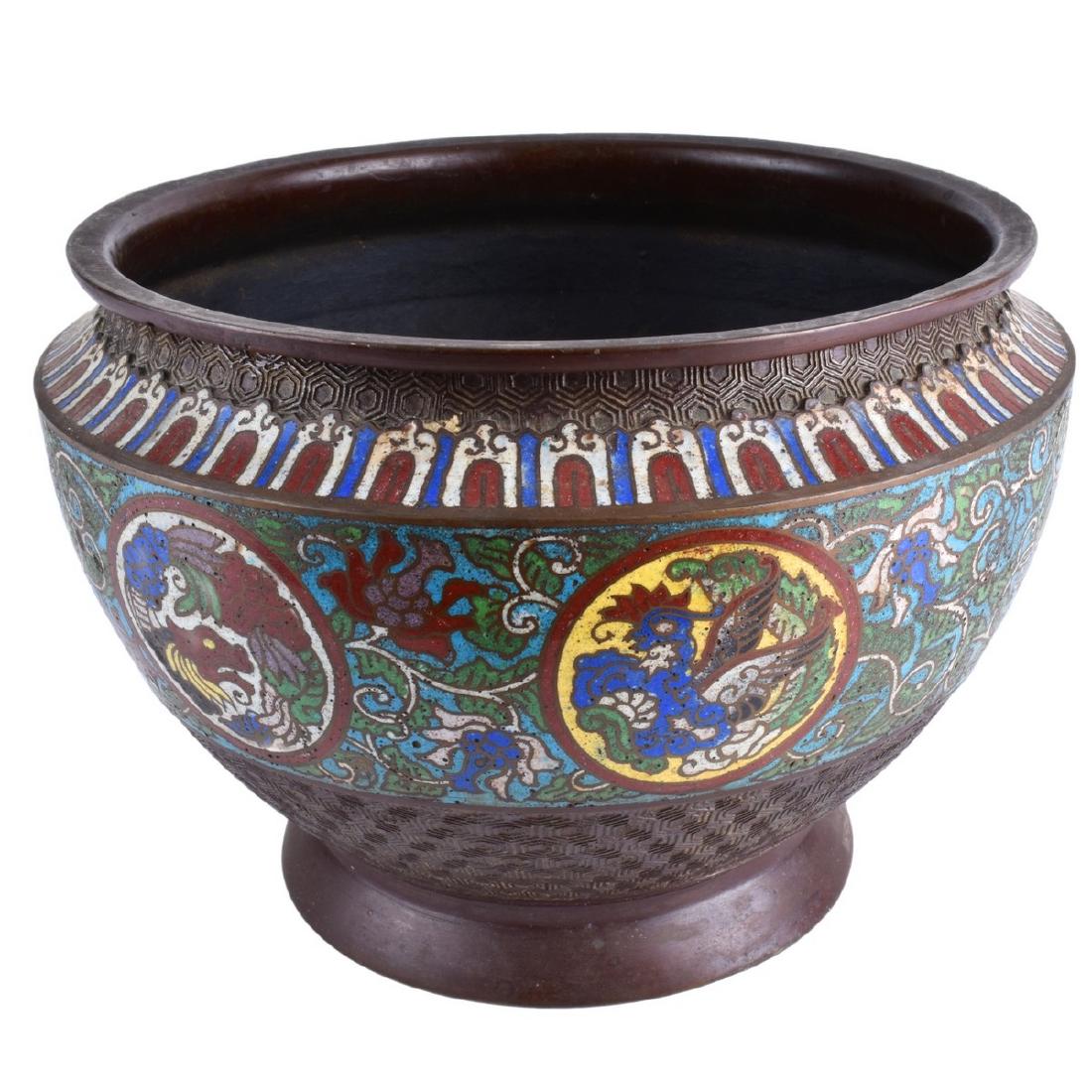 Antique Japanese Bronze Champleve Enamel Jardinier: Antique Japanese Bronze Champleve Enamel Jardiniere. Floral enamel work with intricate patterns. Measures 7-3/4" H x 11" W. Domestic Shipping: $125.00