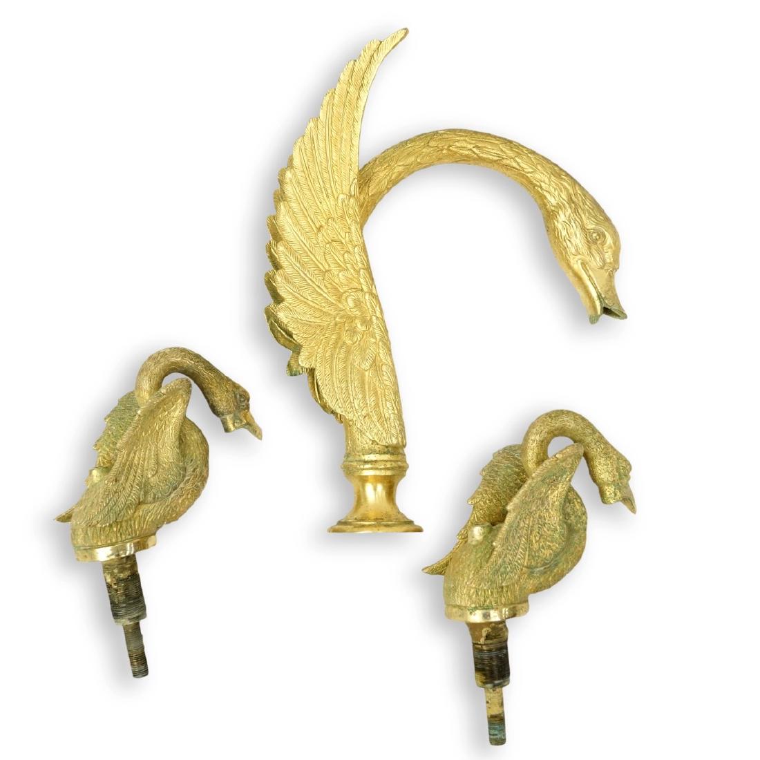 Yordan's Inc. 24K Gold Plated Bronze Swan Spout: Yordan's Inc. 24K Gold Plated Bronze Swan Spout Fixtures with Parts. Booklet includes. Available parts are for a shower and sink. Largest spout measures 13-1/4" H x 7-1/4" W, smallest 9" H x 4" W. Con