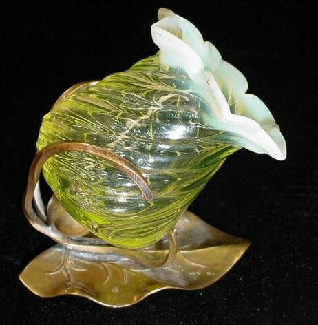 Thomas Webb & Sons Opalescent Vaseline Glass Tooth: Thomas Webb & Sons Opalescent Vaseline Glass Toothpick Holder Mounted in a Brass Figural Leaf Shape Frame. The Body of the Glass has a Swirl and the Opalescent Rim in the Petal Shape as Used in Webb's