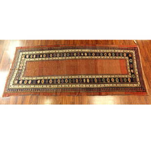 Semi Antique Persian Rug: Semi Antique Persian Runner. Multi colored on faded red ground. Measures 142" H x 70" W. Condition: Stains and losses to fringes, stains, wear, Domestic Shipping: Third party Min Est. $100.00 Max Est.