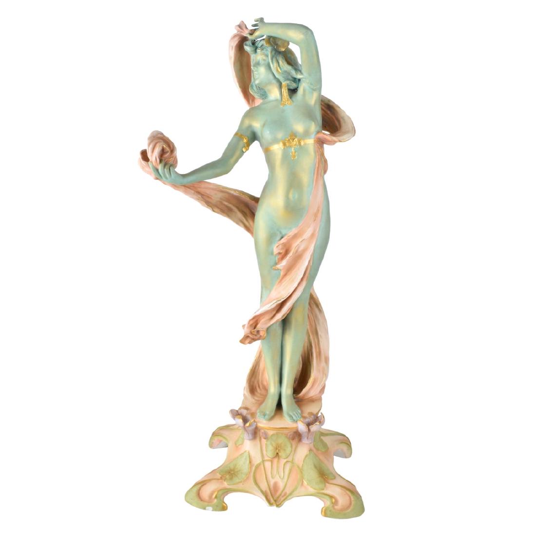 Ernst Wahliss Turn Vienna Porcelain Figurine: Ernst Wahliss Turn Vienna Porcelain Maiden Figurine. Signed to base. Measures 19" H x 8-1/2" W. Condition: Nick to base otherwise good condition Domestic Shipping: Third party Min Est. $200.00 Max Est