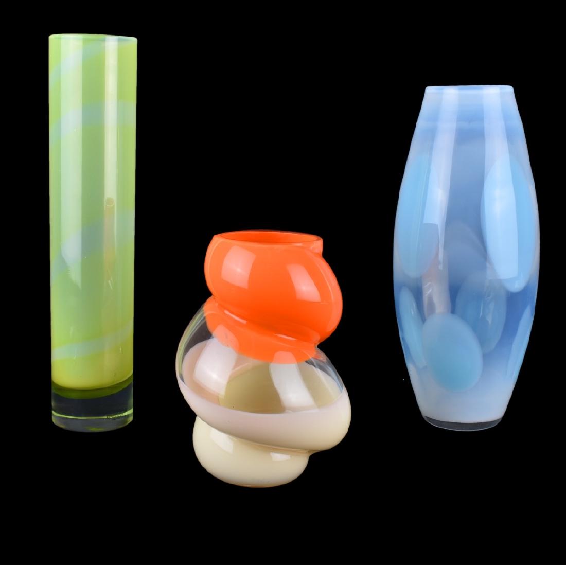 Grouping of Three (3) Vintage Art Glass Vases: Grouping of Three (3) Vintage Art Glass Vases. Includes: Jeff Zimmerman opalescent vase, Pagur orange to clear vase, and Kosta Boda yellow to clear vase. Tallest measures 13-1/2" H, smallest measures