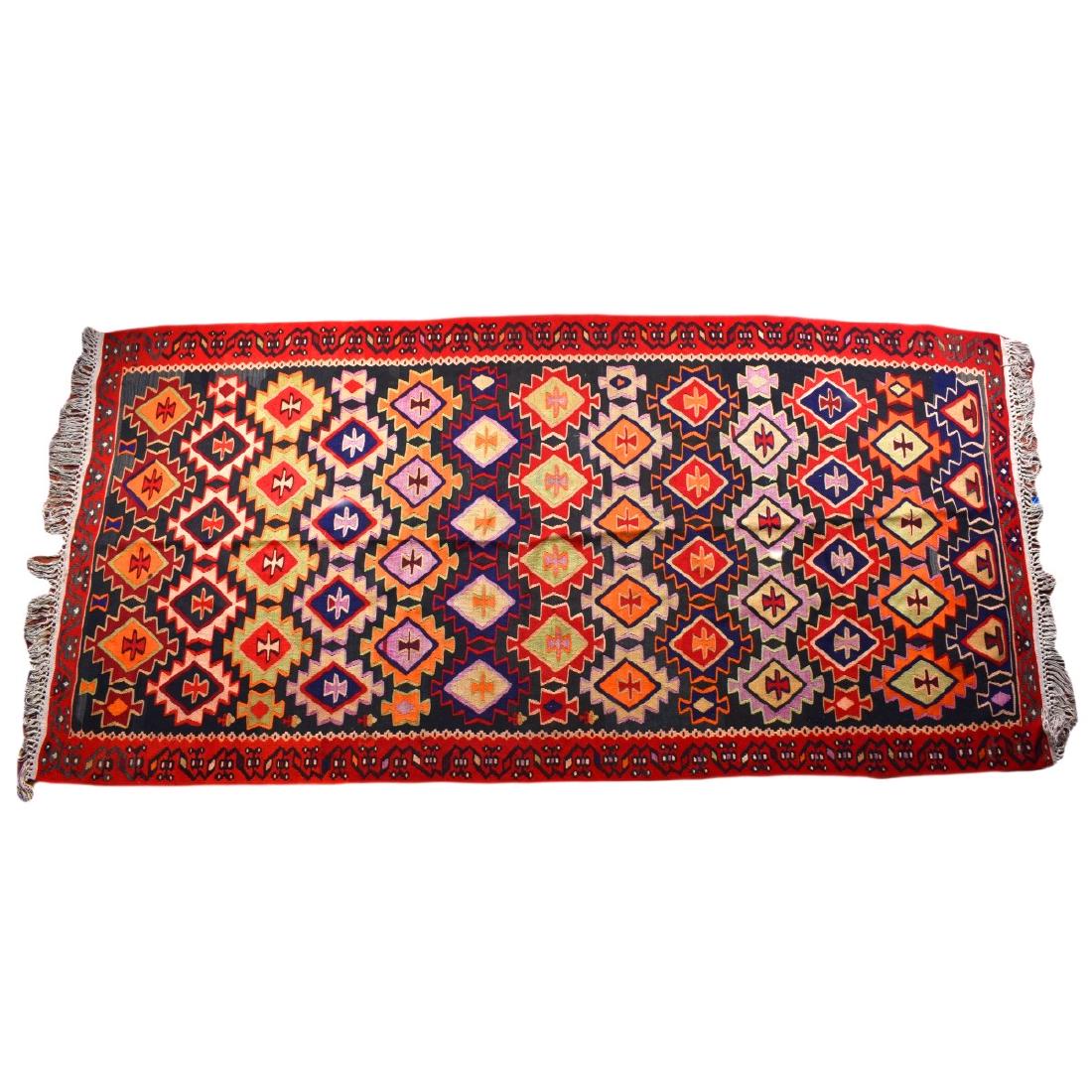 Kilim Rug: Kilim rug. Unsigned. Measures 97" x 49" Condition: Good condition. Domestic Shipping: $85.00 Min Est. $100.00 Max Est. $150.00