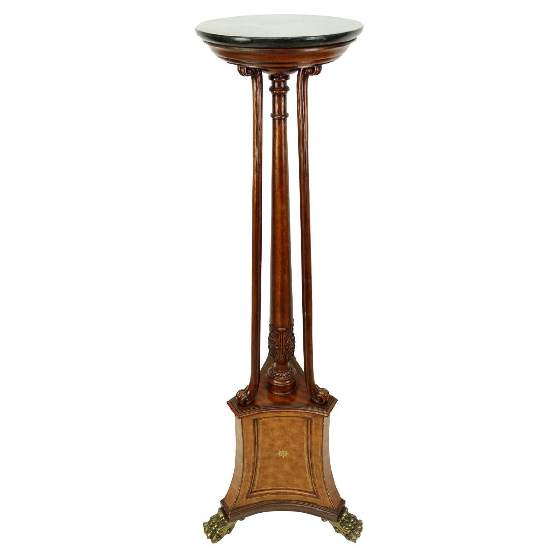 Large Torchere: Large Neoclassical style Torchere with Marble Top and Paw Feet. Measures 70-7/8" H x 25" W. Condition: Base has a few scratches to corners, crack at the stem otherwise good condition Estimate: $200.00