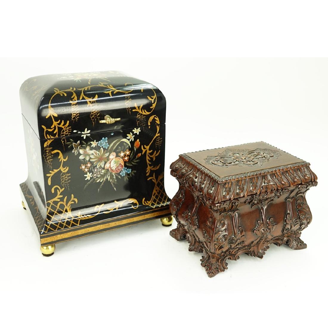 Two Maitland Smith Boxes: Two (2) Maitland Smith Decorative Boxes. One of carved wood, one hand painted floral motif. Both marked with original labels. The larger box measures 11" H x 10" W x 8". Condition: Very good condition