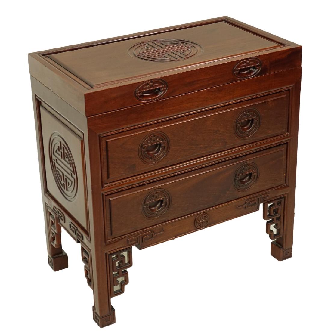 Chinese Silverware Cabinet: Mid Century Chinese Rosewood Rectangular Silverware Cabinet. Hinged top with two sliding drawers, openwork apron. Measures 26" H x 25" W x 14" D. Condition: Good condition Estimate: $100.00 - $200.00 