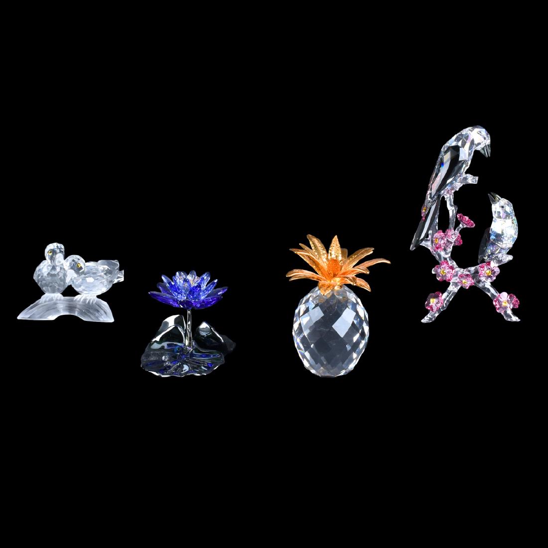 Four Swarovski Figurines. (1 of 5)