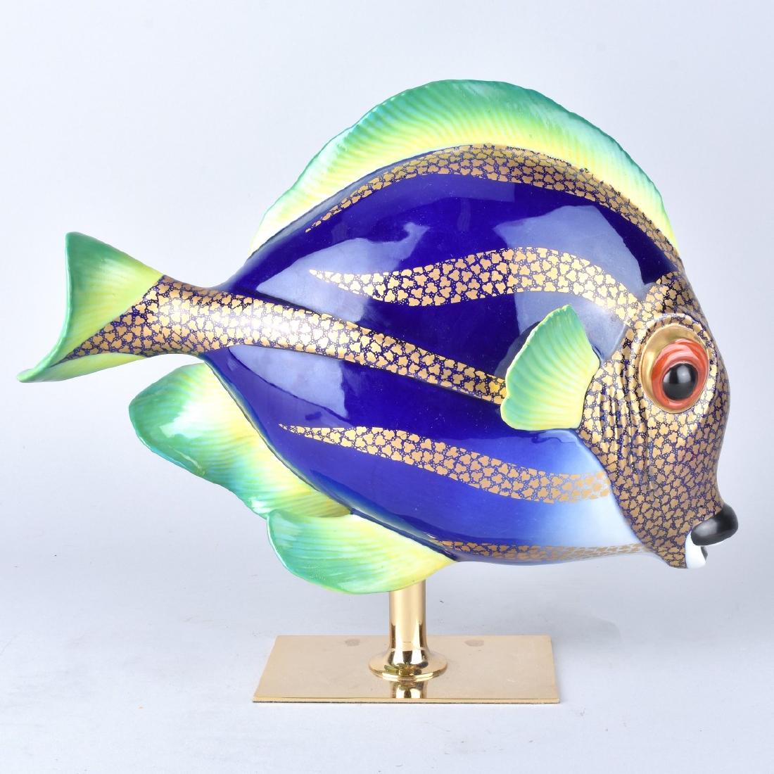 Oggetti Mangani Fish Figurine: Mid Century Italian Oggetti Mangani Porcelain Tropical Fish Figurine Mounted on Brass Base. Signed and original sticker label attached on surface. Measures 11-1/2" H x 14" W (with stand). Condition: G