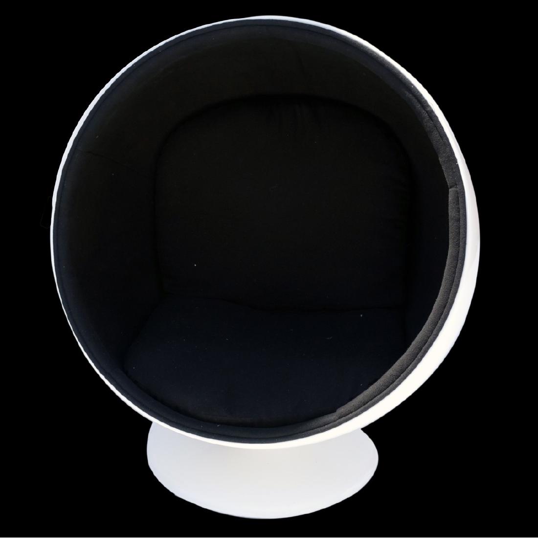 After: Henrik Thor-Larsen Egg Chair: After: Henrik Thor-Larsen Danish (b. 1932) Mid Century Modern Olivia Egg Chair. Fiber glass frame with black wool and nylon cushioning. Removable rotating base. Measures 48" x 40" x 33". Provenance: F