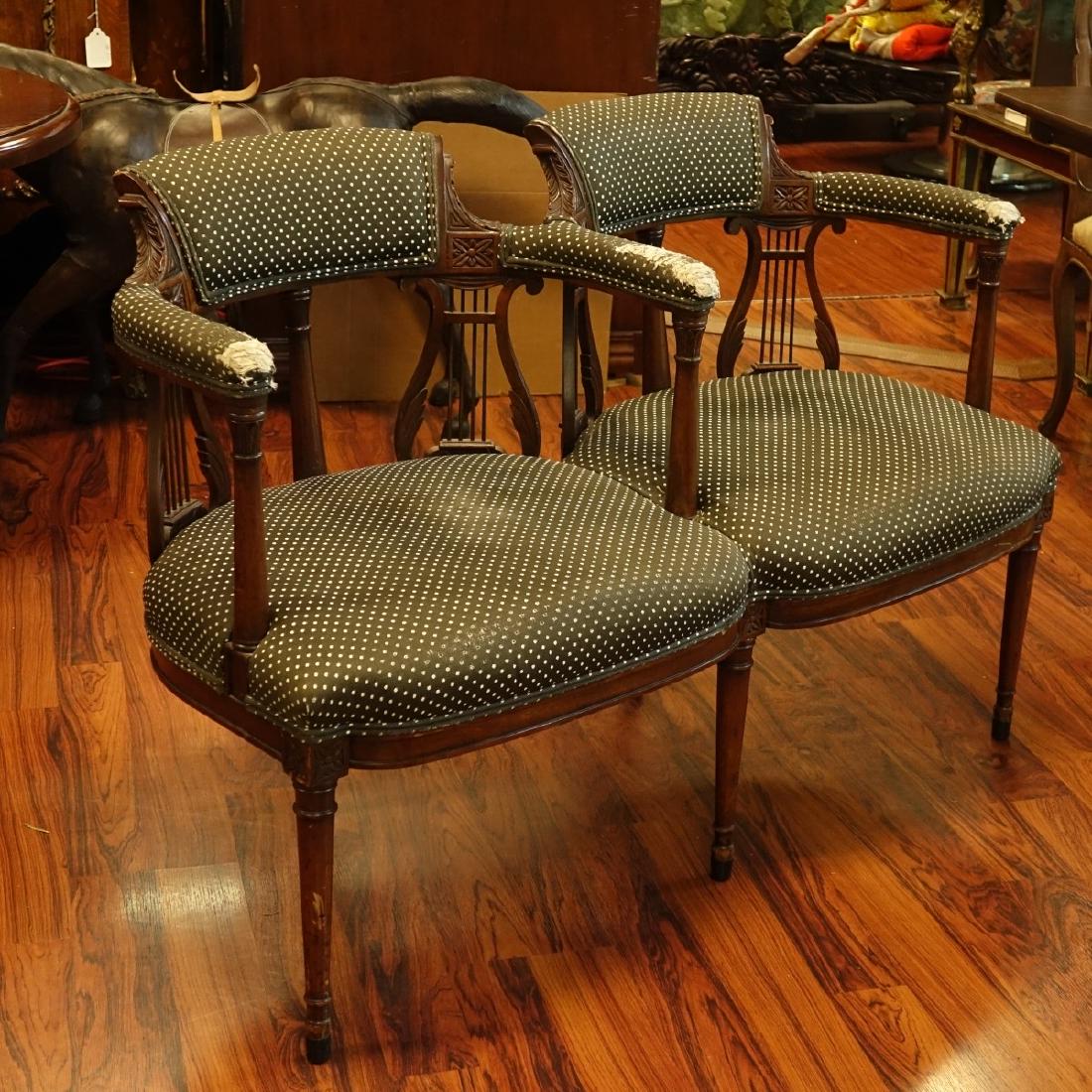 Antique Mahogany Chair: Antique Caved Mahogany Upholstered Dual Chair. Double harp back, carved acanthus leaves motif, and tapering legs. Measures 33" H x 47-1/4" W x 21" D. Condition: Wear to upholstery, scratches to legs E