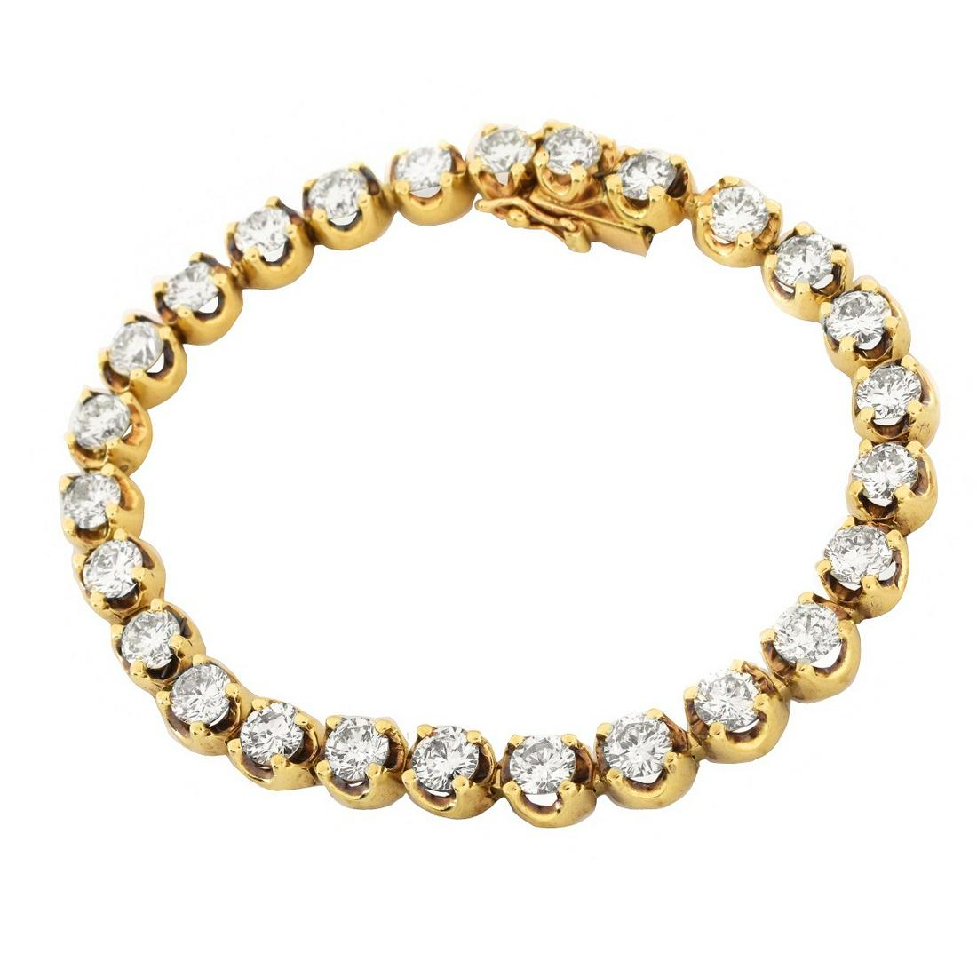 8.0ct Diamond and 14K Tennis Bracelet: Vintage Approx. 8.0 Carat Round Brilliant Cut Diamond and 14 Karat Yellow Gold Tennis Bracelet. Diamonds G-H color, VS2-SI1 clarity. Measures 6-7/8" L, 3/16" W. Approx. weight: 20.7 grams. Condition: 