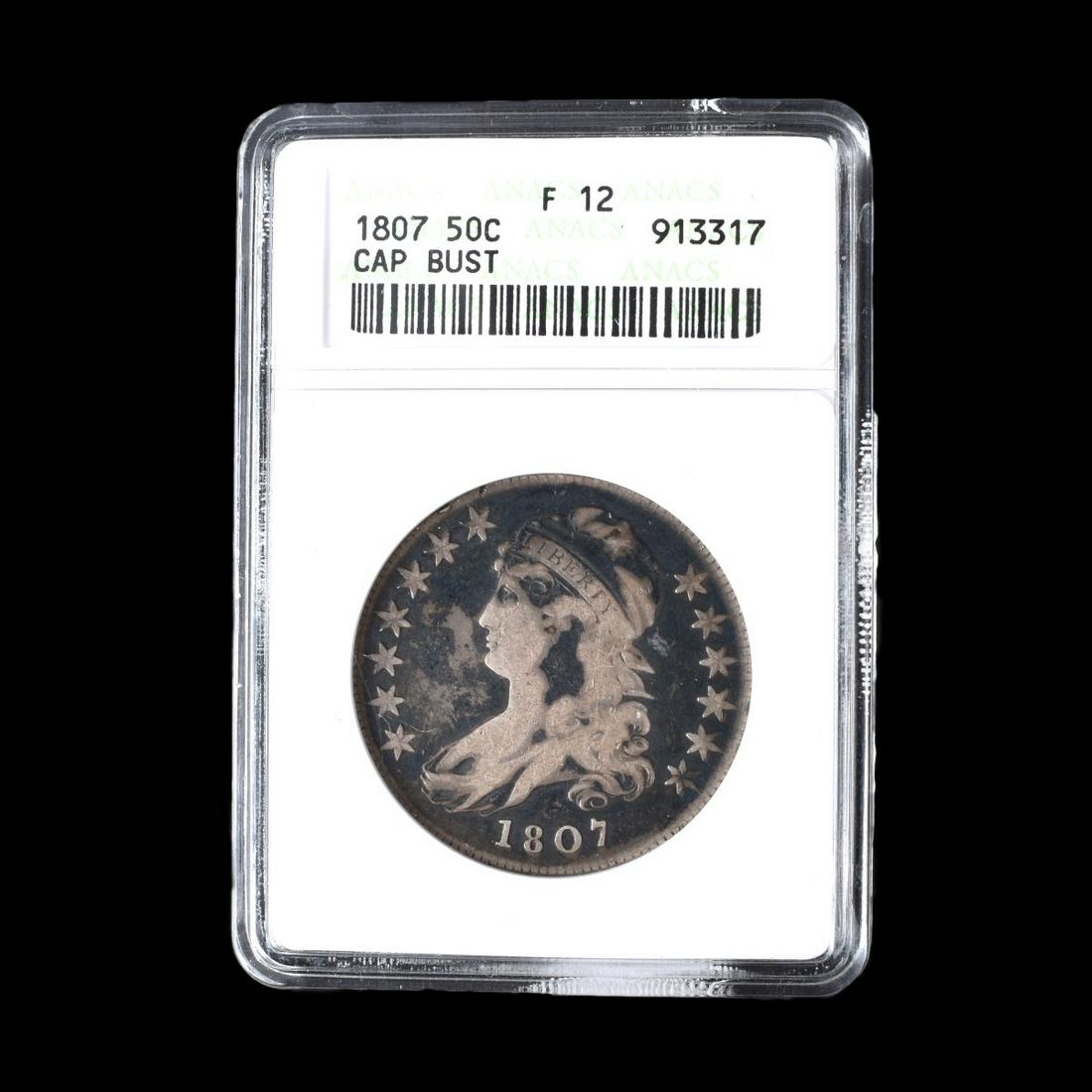 1807 U.S. Capped Half Dollar: 1807 United States Capped Bust Half Dollar in Plastic Display. Obverse: bust of Liberty. Reverse: American Bald Eagle. Engraver: John Reich. Measures 32.5 mm. Weighs approx. 13.48 grams. Condition: Gr