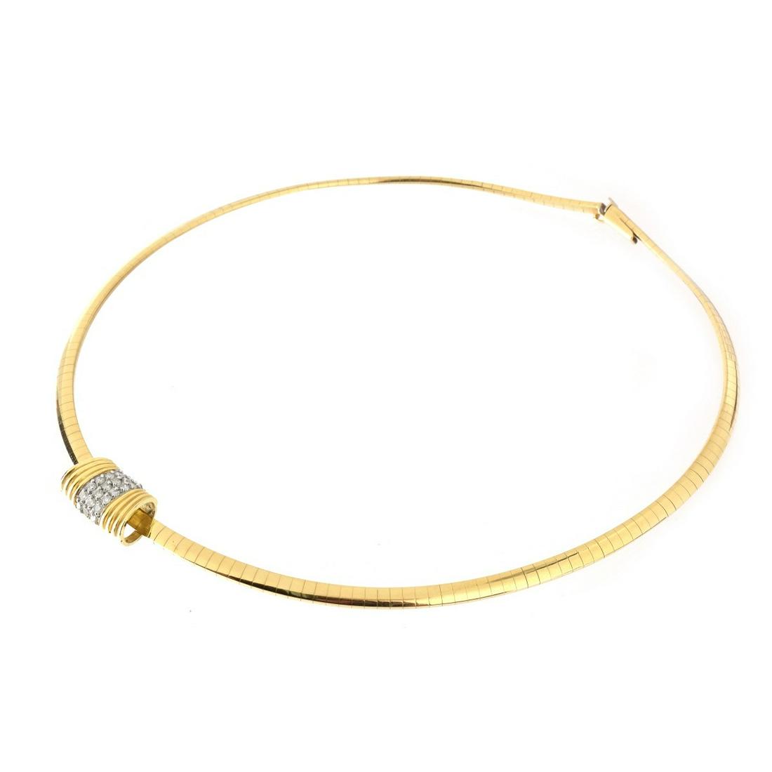 14K and Diamond Omega Necklace: Vintage 14 Karat Yellow Gold and Diamond Omega Necklace With Slide. The slide set with 21 round brilliant diamonds of G-H color and VS2-SI1 with a few SI2. Stamped 14K Made In Italy. Measures 16-1/2" 