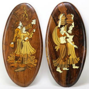 Pair of Italian Inlaid Plaques: Pair of Italian Marquetry Inlaid Wooden Plaques. Each with figural motifs. Unsigned. Measures 16-1/2" H x 8" W. Condition: One with an age split, scratches otherwise good condition. Estimate: $50.00 -