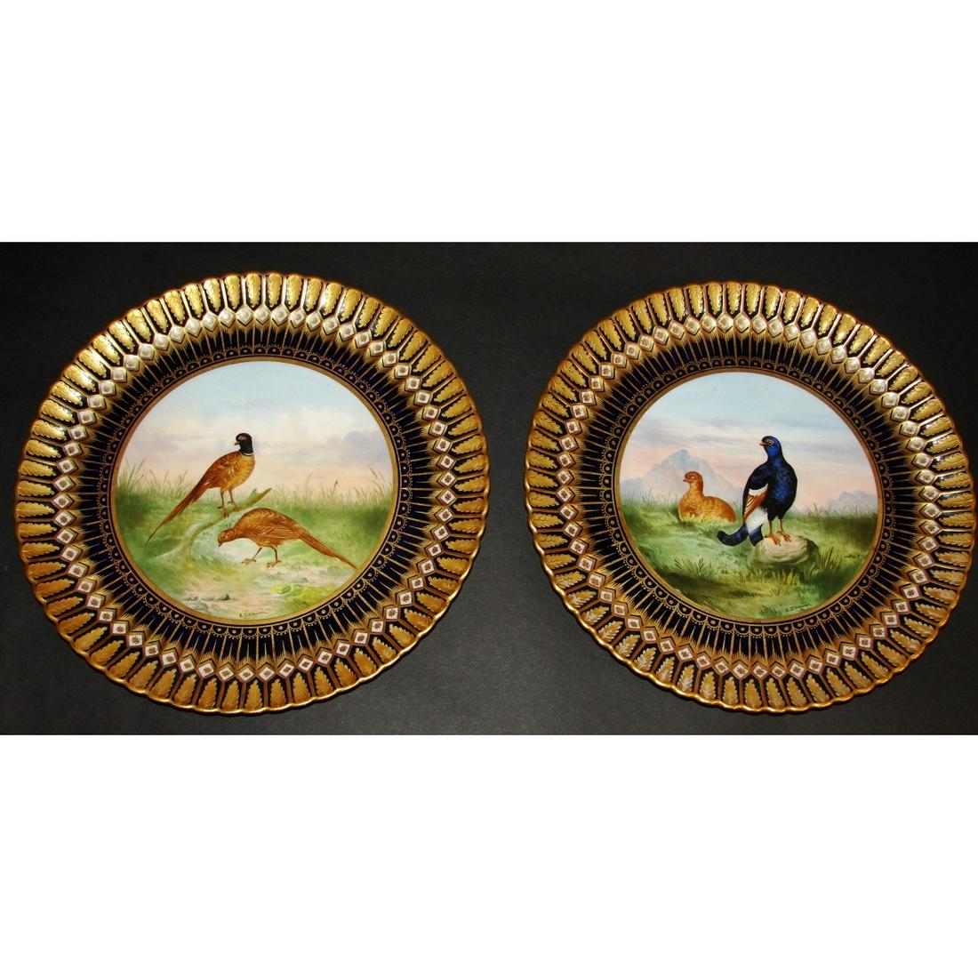 Pr. of Tiffany & Co. Cabinet Plates by C.J. Weaver: Pair of Tiffany and Co. Fine Painted Cobalt and Gold Cabinet Plates. Signed C.J. Weaver and signed Tiffany and Co. New York on obverse side. Each features a portrait of exotic birds. Measures 8-1/4" D
