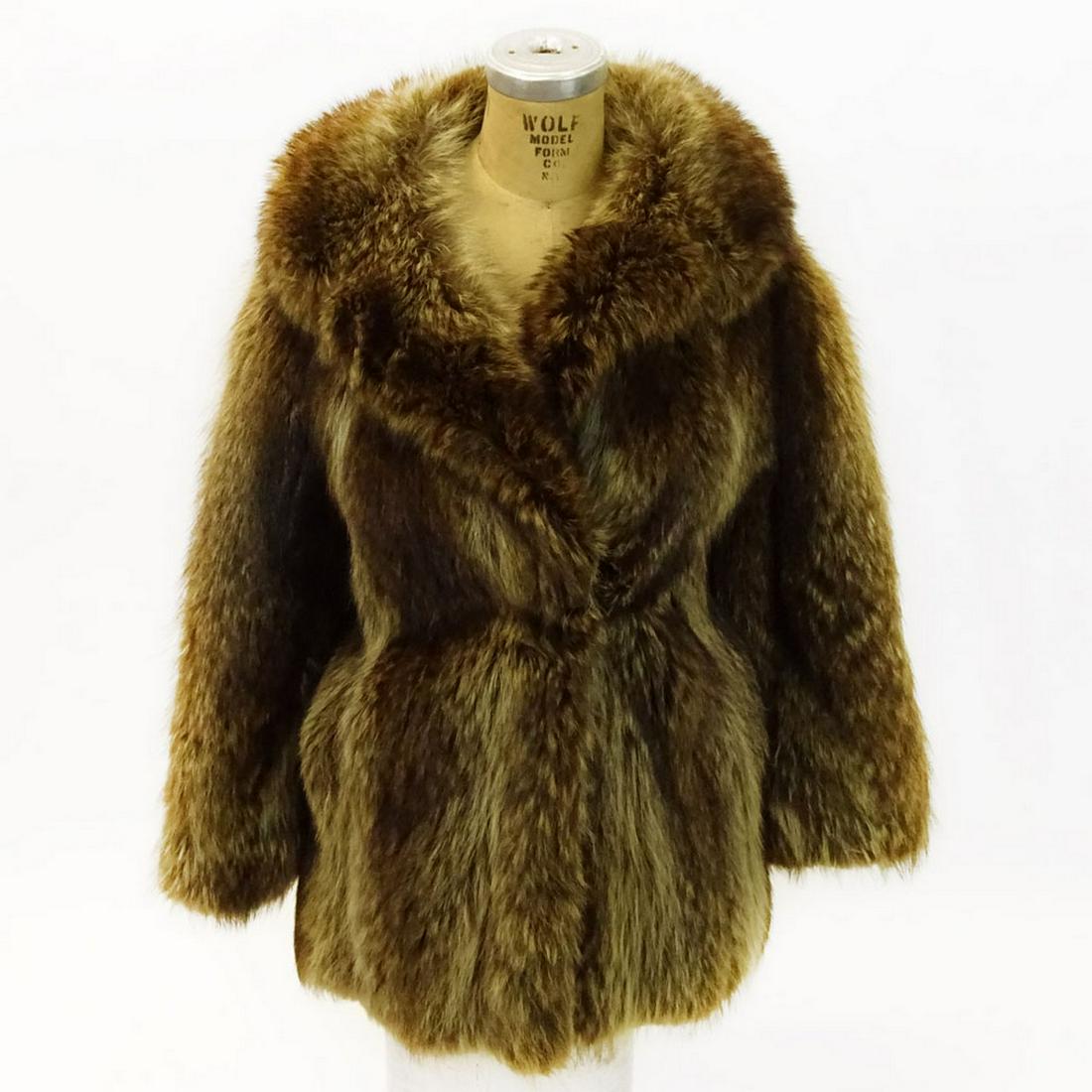 Vintage Raccoon Fur Jacket: Vintage Raccoon Fur Jacket. Labeled Angelos Mellides A & M Furs. Size small, 31" L. Condition: Good condition. name inside Lorraine Estimate: $50.00 - $150.00 Domestic Shipping: $55.00