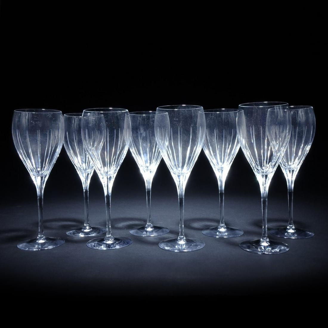 8 Christofle Iriana Crystal Wine Glasses: 8 Christofle "Iriana" Crystal Wine Glasses, signed etched to bottom. Measures 8-3/4" H x 2-7/8 diameter foot. Condition: Good condition, Estimate: $100.00 - $200.00 Domestic Shipping: $88.00