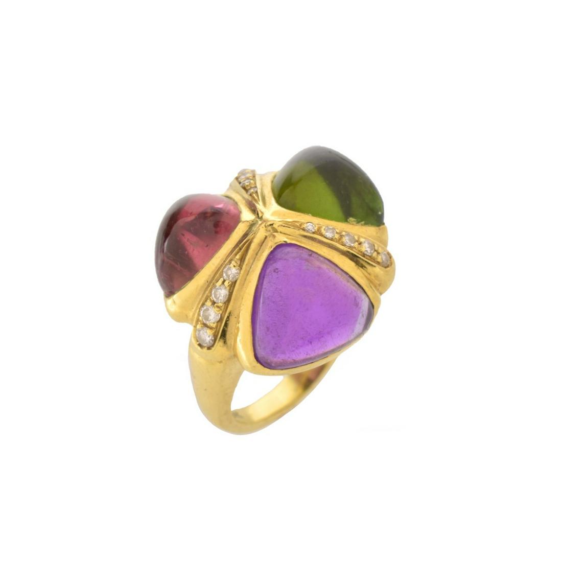 Gemstone and 18K Ring: Vintage Cabochon Multi Gemstone, Diamond and 18 Karat Yellow Gold Ring. Stamped 18K. Purchased at H. Stern Jewelers. Ring size 5-1/4. Ring top measures 3/4" diam. Approx. weight: 11.7 grams. Condition