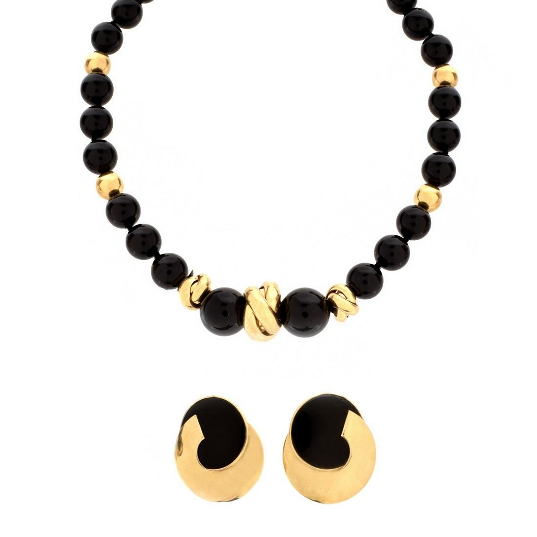 Onyx and 14K Necklace and Earrings: Vintage Black Onyx Bead and 14 Karat Yellow Gold Necklace and Black Onyx and 14K Earring Suite. Signed MAZ, 14K. Necklace measures 17" L, 5/8" W. Earrings measure 1-5/16" x 1-1/16". Approx. weight: 86