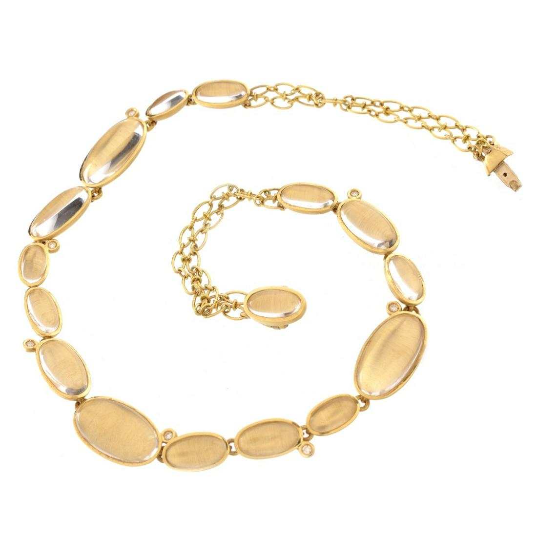 Moonstone and 18K Necklace: Vintage Italian Oval Moonstone and 18 Karat Yellow Gold Necklace Accented with Small Round Brilliant Cut Diamonds. Stamped 18K, Italian hallmark 3528 AL, purchased at H. Stern Jewelers. Measures 15" L