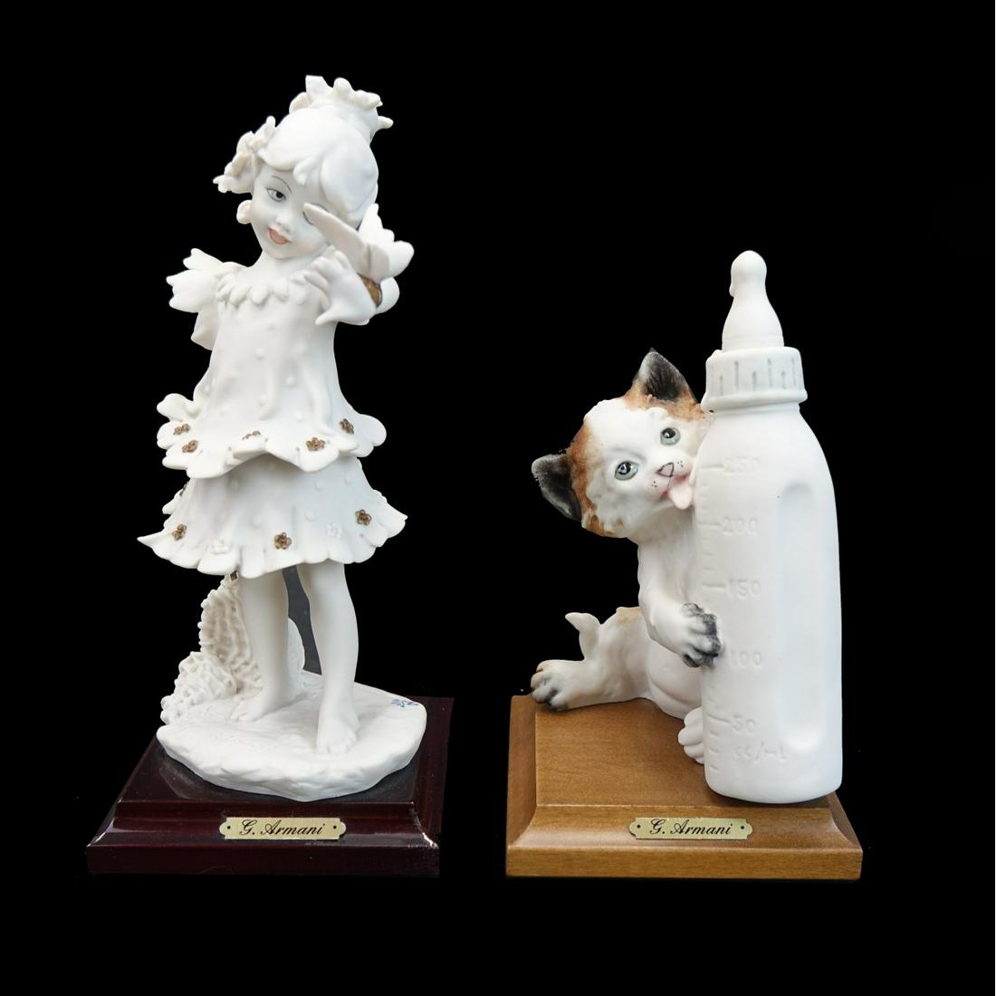 Two Giuseppe Armani Figurines: Two Giuseppe Armani Figurines. Butterfly Girl measures 8" H, and Kitty cat with baby bottle measures 6-1/2" H both with Armani plaques, and signed Florence, incised G. Armani, Cappodimonti blue mark C
