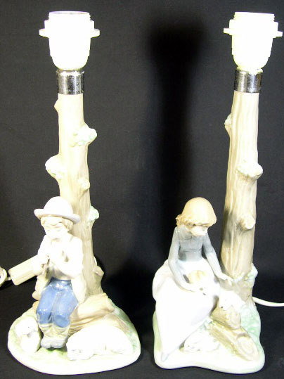 Pair of 20th Century Nao Porcelain Tree Lamps. Sig