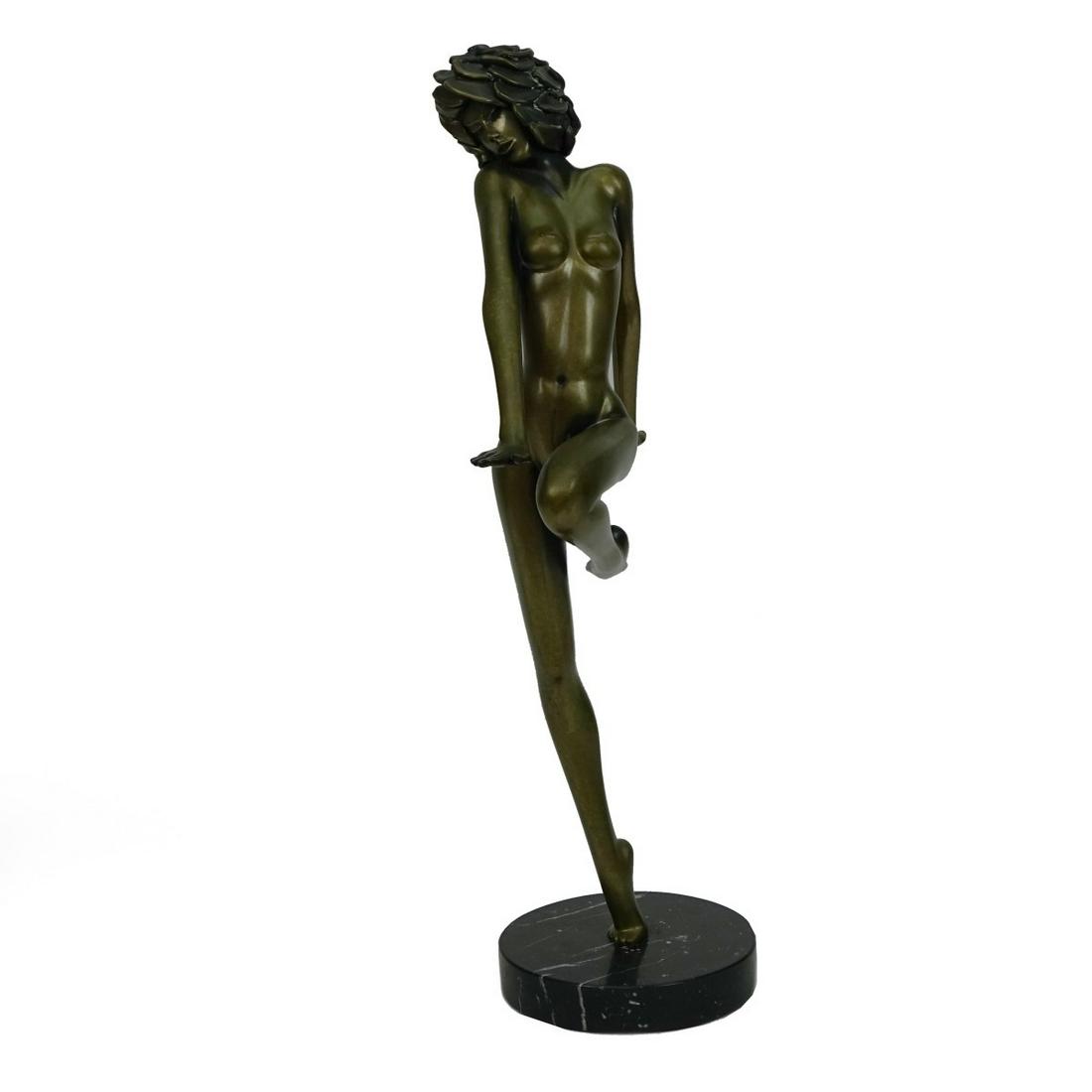 Tom Bennett (1928- ) Lg. Bronze "Fascination": Tom Bennett (1928- ) Large Nude Bronze "Fascination" brown patina, on round marble base, signed script Tom Bennett 1984, 43/150, measures 28" H x 14" W base 1-1/2" H Condition: Good condition, needs a