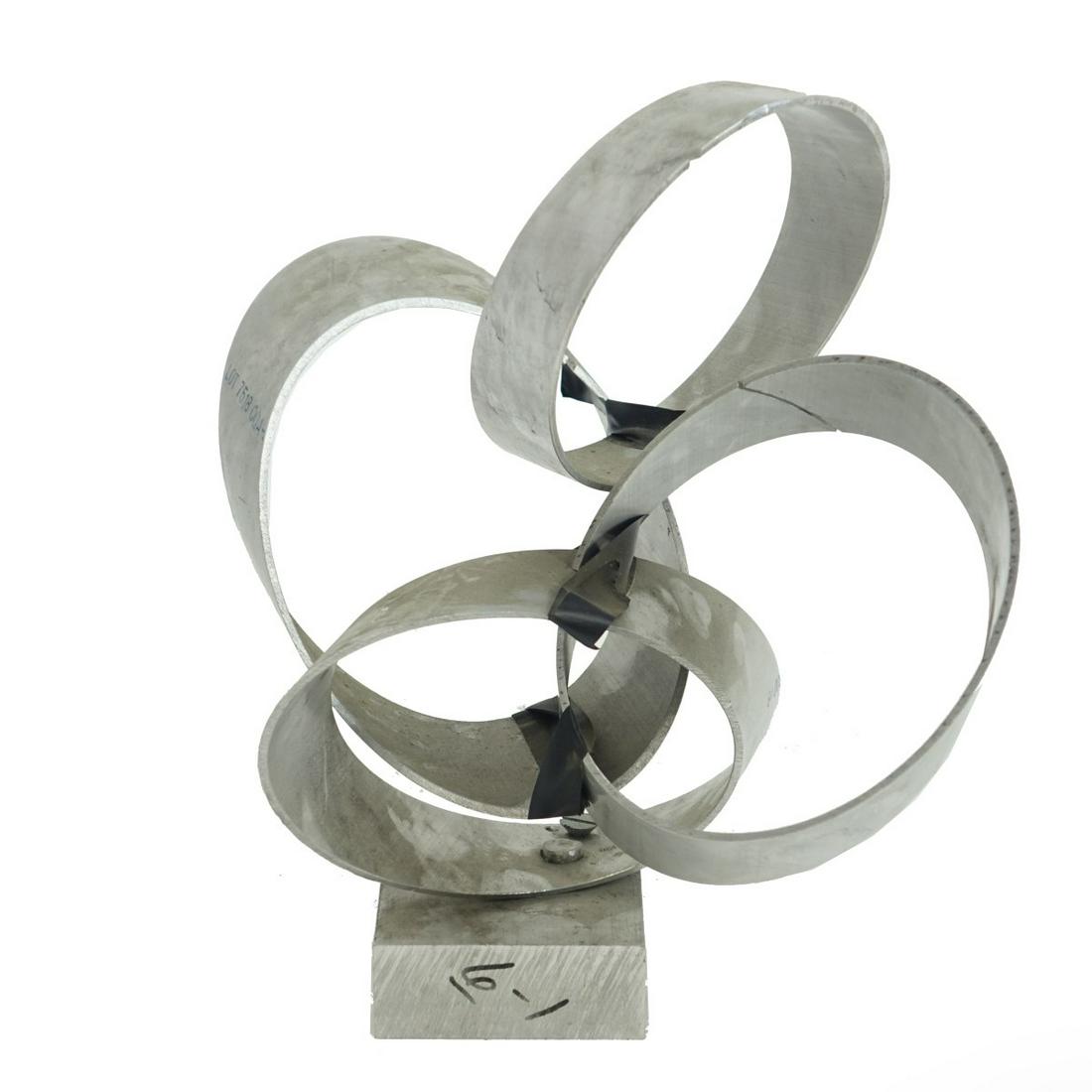 Larry Mohr, American (1921 - 2013): Larry Mohr, American (1921 - 2013) Aluminum Sculpture "Orbitz VIII" Signed and Dated 6/24/96 at the base. Measures 14-7/8" x 17" x 10". Provenance: Estate of Larry Mohr. Larry Mohr was an accomplished