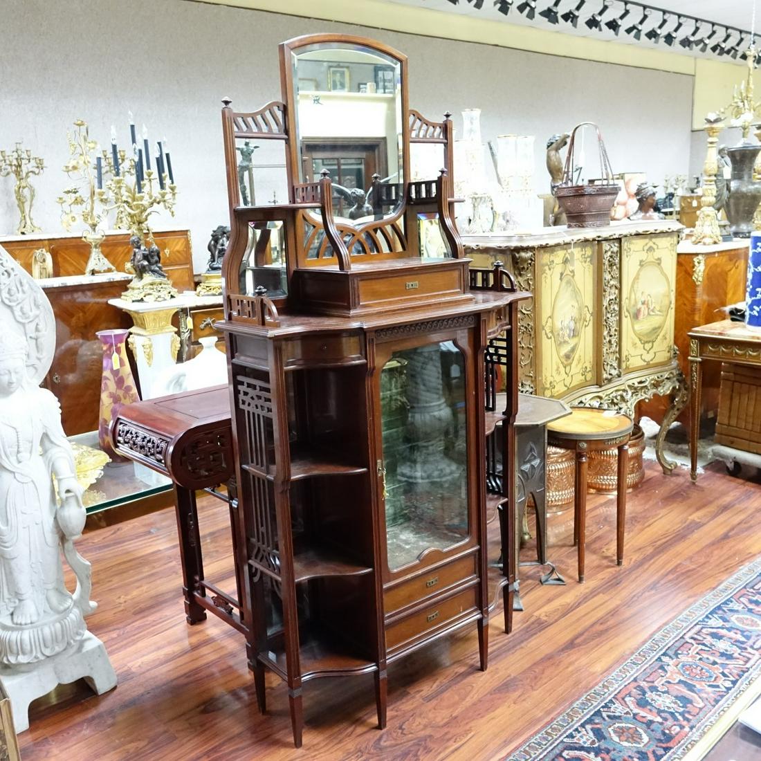 Antique Victorian Mahogany Etagere: Antique Victorian Mahogany Etagere. Having 3 sliding drawers with locking mechanism, large fitted door, glass shelves on interior and velvet backing, inset mirrors, flanked with shelves, and stands on