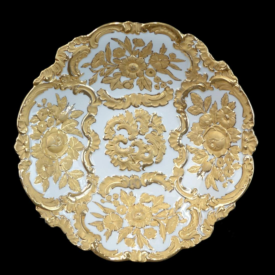 Antique Meissen Porcelain Bowl: Antique Meissen Gilt Painted Porcelain Bowl. Blue crossed swords mark with slashes to the base. Decorated with continuous flower motif. Measures 2-3/4" H x 12-1/4" dia. Condition: Good condition Estim