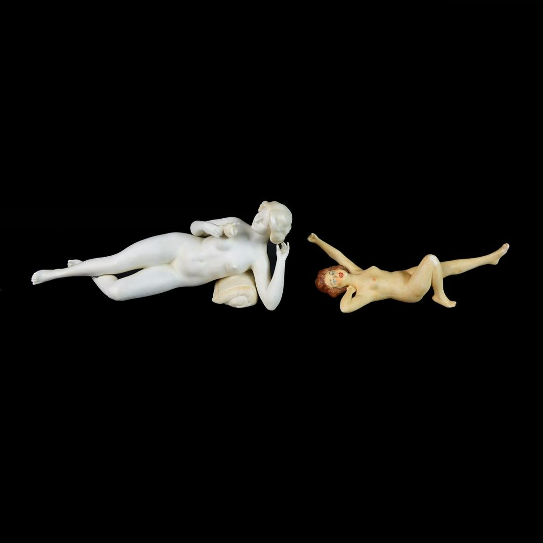 Two (2) Vintage Reclining Nude Bathing Beauties: Grouping of Two (2) Vintage Continental Bisque Reclining Nude Bathing Beauties. One has some numbers stamped to the base otherwise unsigned. Largest measures 3" H x8" L, other measures 1-1/2" H x 6" L
