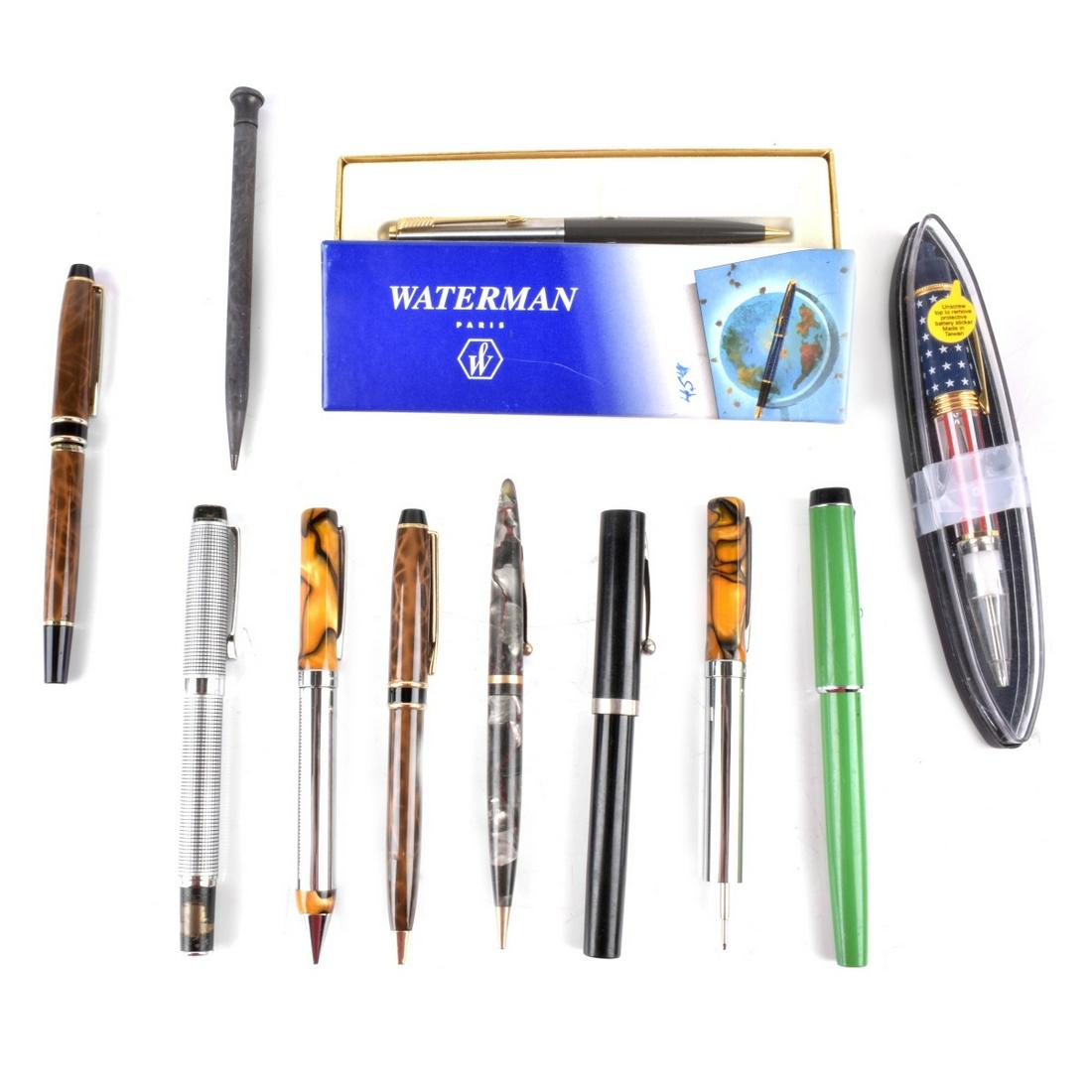Eleven Ballpoint Pens: Eleven Ballpoint Pens Including Two Pierre Cardin, Two Sheaffer's, One Eversharp (Sterling), One Parker, One Waterman (in box), an American flag pen (in box) and one marked Russell. Resin and/or metal