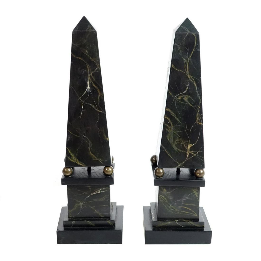 Pair of Slate and Bronze Obelisks: Pair of Vintage Marbleized Slate and Bronze Obelisks. Measure 15-1/4" H, 4-1/2" W (at base). Condition: Good vintage pre-owned condition. Minor chips. Estimate: $100.00 - $200.00 Domestic Shipping: $1