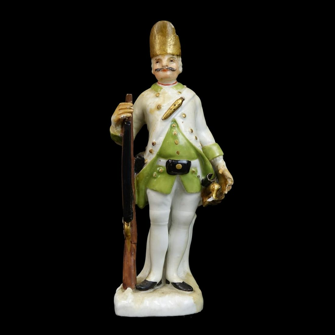 Meissen Porcelain Soldier: Antique Meissen Hand Painted Porcelain Soldier. Crossed sword mark on obverse side. Measures 5" H. Condition: Chips and losses. Estimate: $50.00 - $150.00 Domestic Shipping: $32.00