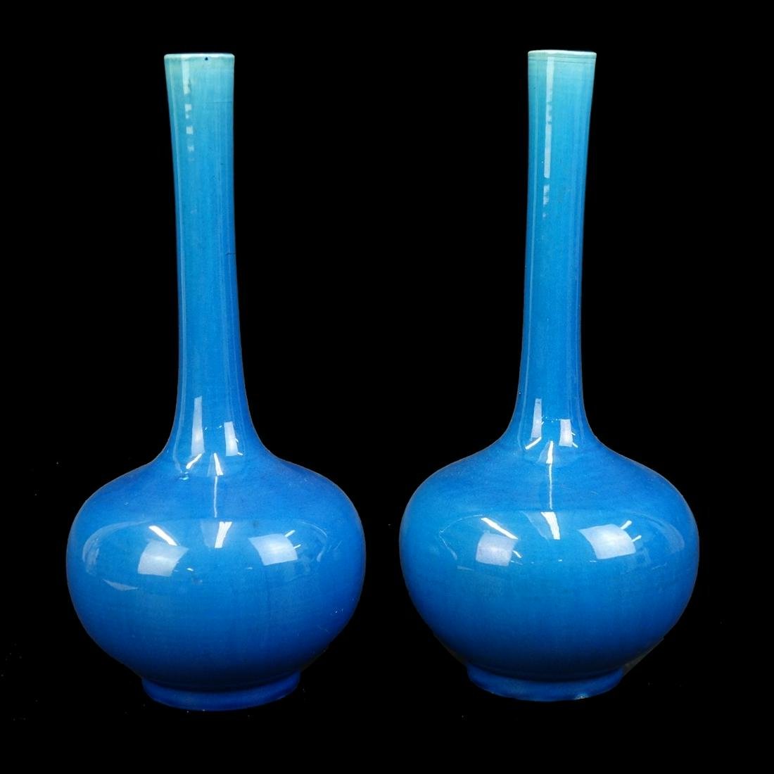 Pair of Chinese Style Vases: Pair of Modern Chinese Style Blue Glazed Porcelain Vases. Unsigned. Measures 12" H. Provenance: The estate of Leon Amar, Palm Beach, Florida. Condition: Normal crazing overall good condition Estimate: