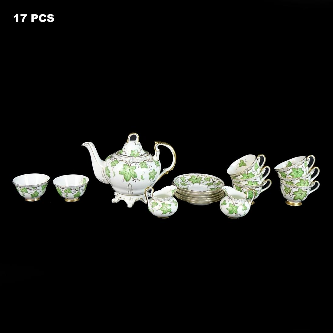 Royal Chelsea "426a" Tea Set: Seventeen (17) Piece Royal Chelsea "426a" English Bone China Tea Set. Includes teapot measuring 7-1/2" x 10", (6) cups measuring 2-5/8" x 3-1/2", (6) saucers, (2) creamers, and (2) waste bowls. Signed