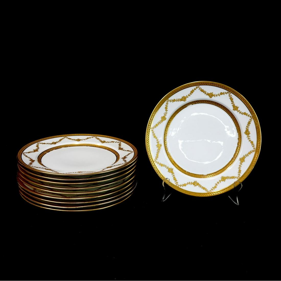(10) Limoges Porcelain Chargers: Set of Ten (10) Limoges Ovington Bros Co. New York Porcelain Chargers. Signed. Measures 9-3/4" diameter. Provenance: The estate of Leon Amar, Palm Beach, Florida. Condition: Rubbing to the gilded surf