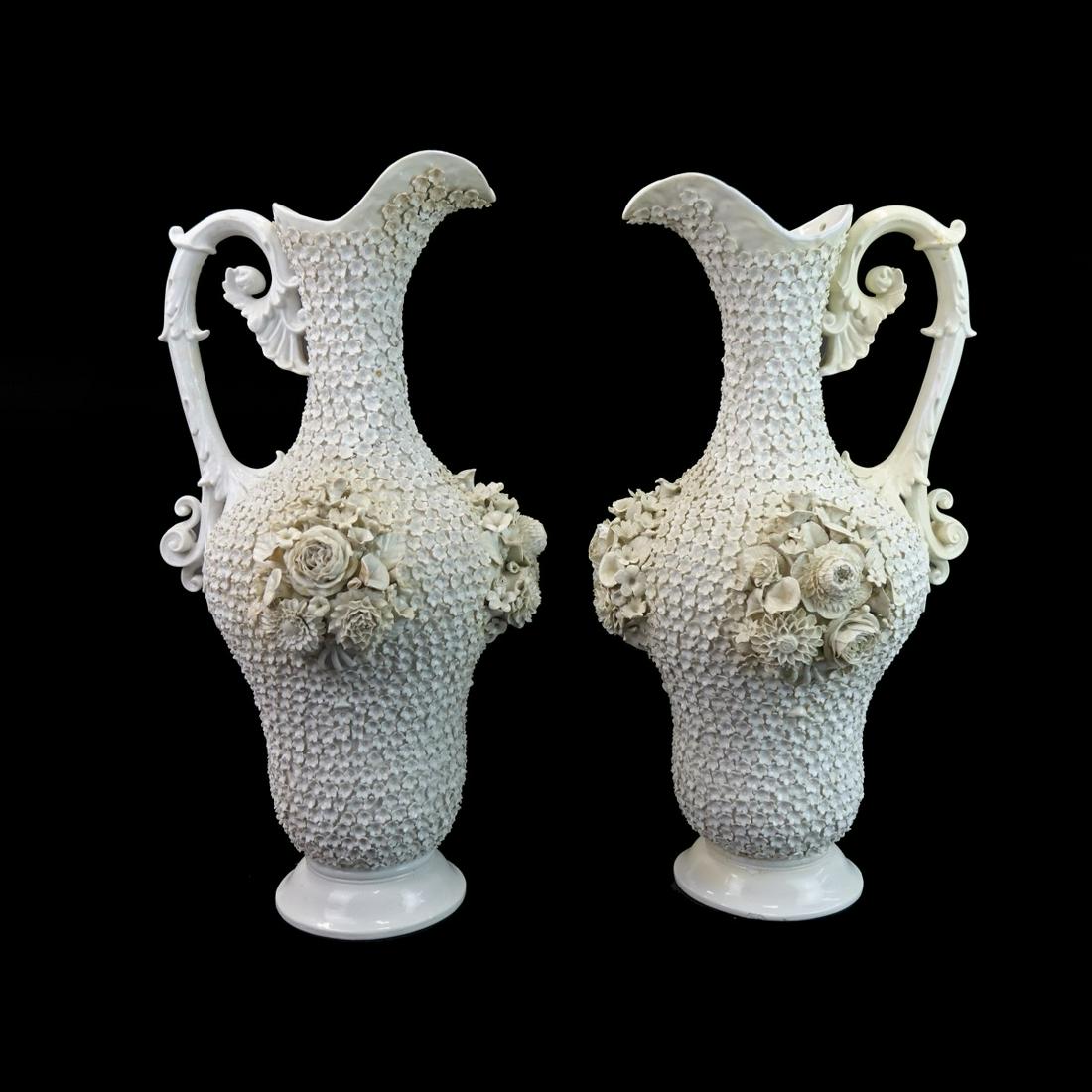 Pr Mid 19C Jacob Petit (1796-1868) Schneeballen: Pair Mid 19C Jacob Petit (1796-1868) Schneeballen Porcelain Ewers. applied bouquets, flower encrusted grounds. signed to bottoms JP in blue, measures 22-1/2" H x 12" W x " deep Condition: AS is with m