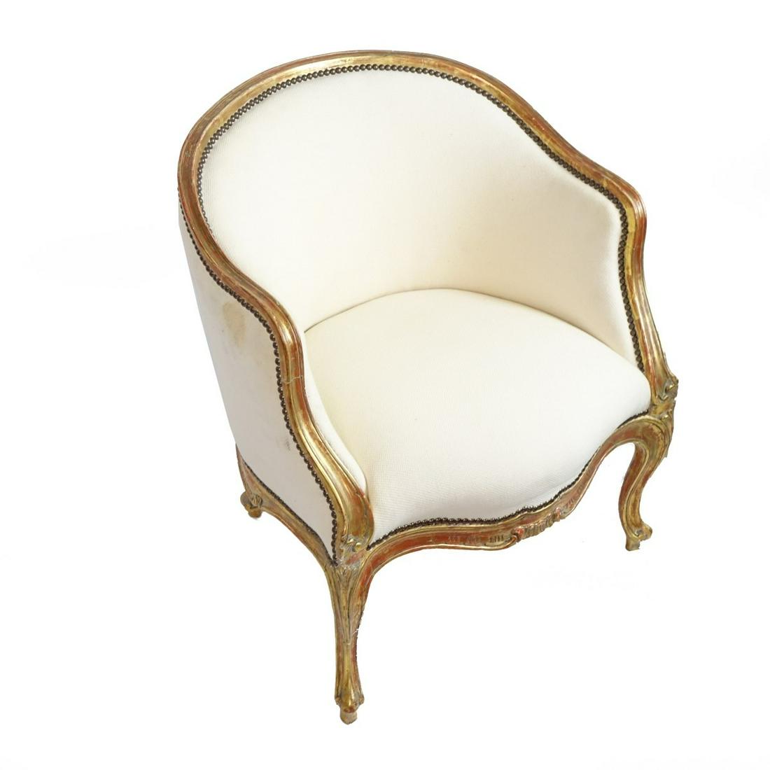 Louis XV style Chair: 19th Century Louis XV style Carved and Gilt Wood Arm Chair. Measures 30" H, 25" W. Provenance: The estate of Leon Amar, Palm Beach, Florida. Condition: Antique used condition. Old repairs to frame. Re