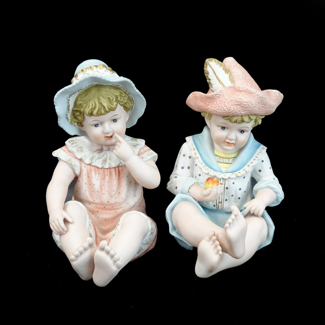 Pair of Andrea Piano Babies: Pair of Large 20th Century Porcelain Piano Babies by Andrea. Signed. Measures 12". Condition: Good condition. Estimate: $50.00 - $150.00 Domestic Shipping: Third party