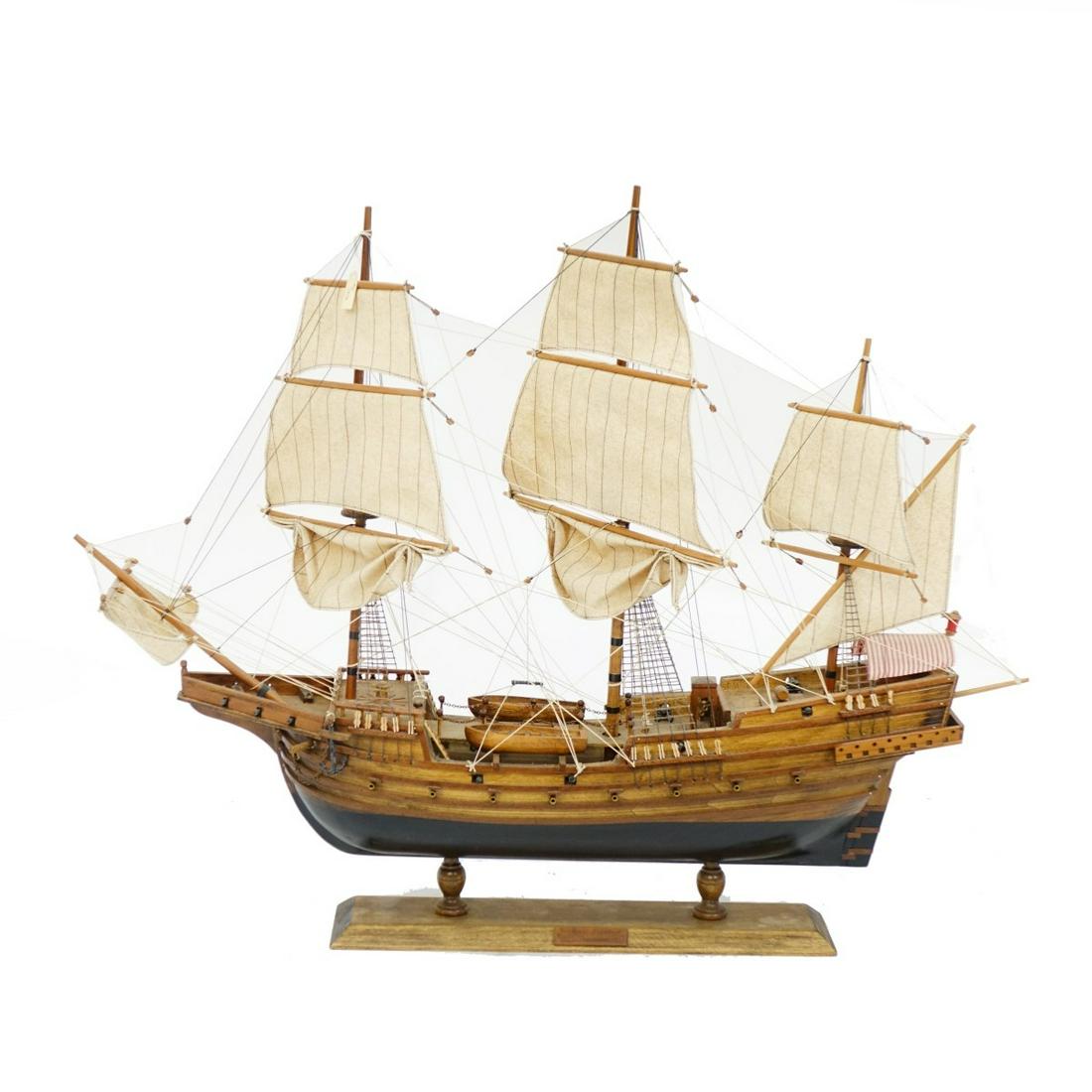 Early 20th C. Model Sailboat: Early 20th Century Wooden Three-Masted Model Sailboat on Wooden Stand. Decorated with cloth sails, intricate hull with cannons. Measures 22-1/2" x 28-1/2". Condition: Needs cleaning, rubbing, good con