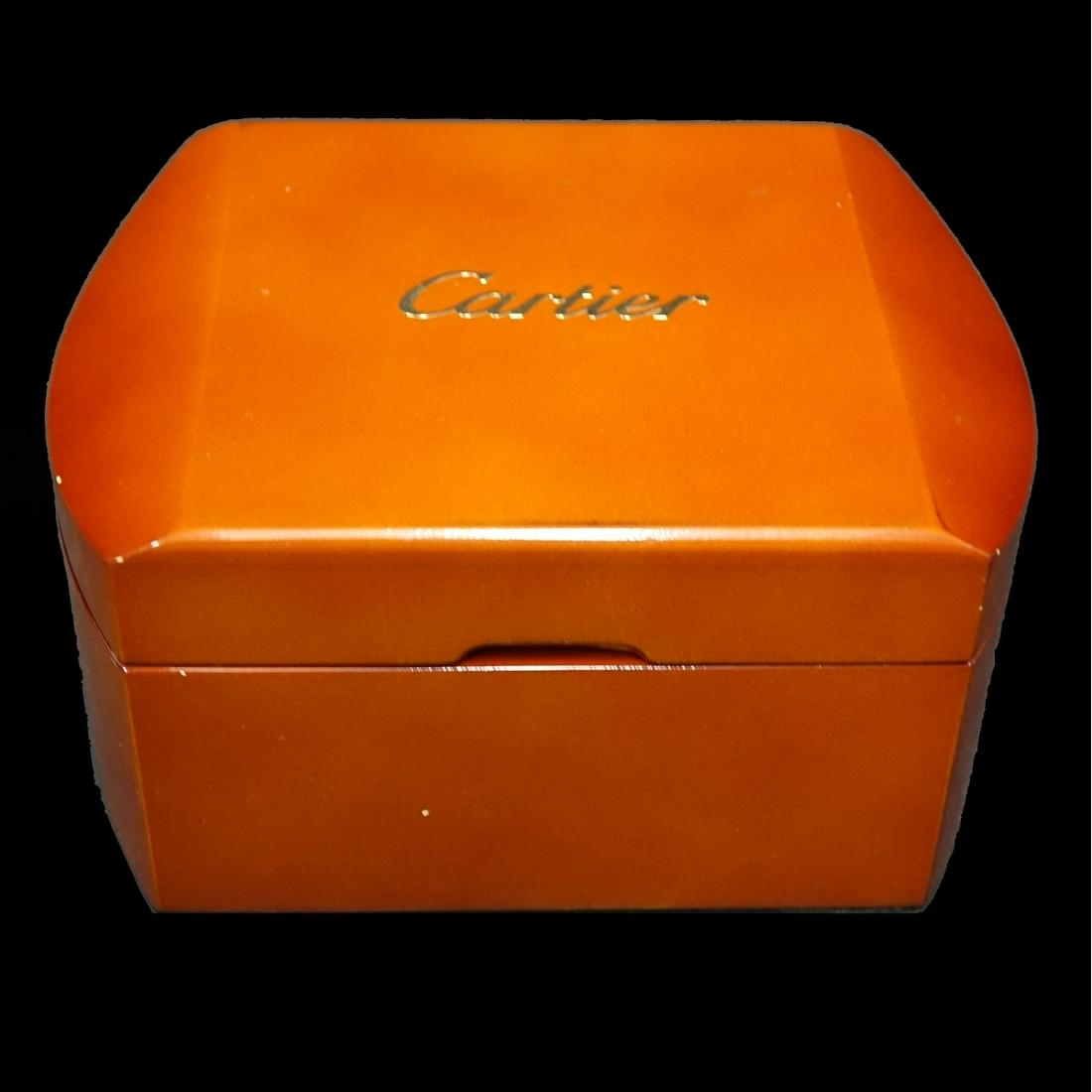 Cartier Wooden Watch Box: Cartier Wooden Watch Box in Fitted Outer Box. Applied makers mark to top. Interior cushion included. Measures 3-1/4" x 6-1/4". Condition: Good condition. Estimate: $50.00 - $75.00 Domestic Shipping: $