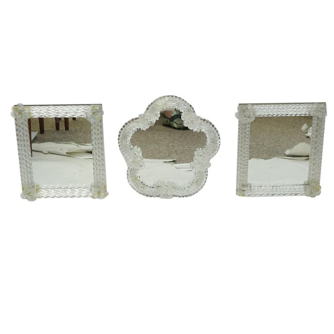 (3) Murano Venetian Art Glass Mirror: Grouping of Three (3) Murano Venetian Art Glass Table Mirrors. Includes a matching pair measuring 12-1/4" x 10", other measures 12-3/4" x 11-1/2". Condition: Losses to the frame, pieces to accompany t