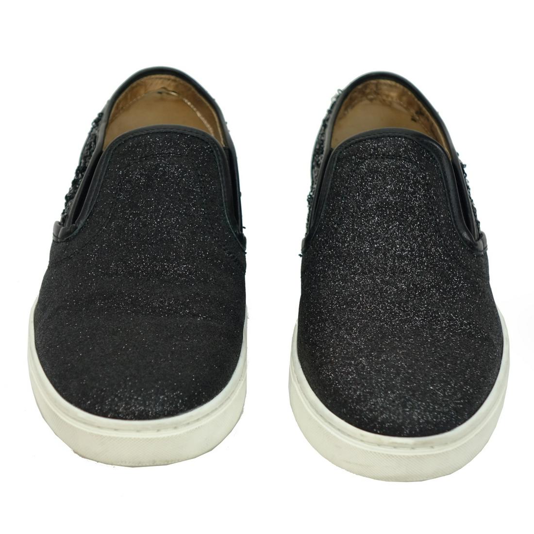 Dolce & Gabbana Slip On Sneakers: Womens Dolce & Gabbana Glitter and Sequin Slip On Sneakers. Serial number CK 0028. Eur. size: 37-1/2. 10% of the proceeds with be donated to the Never Give Up Foundation. In help for children and adul