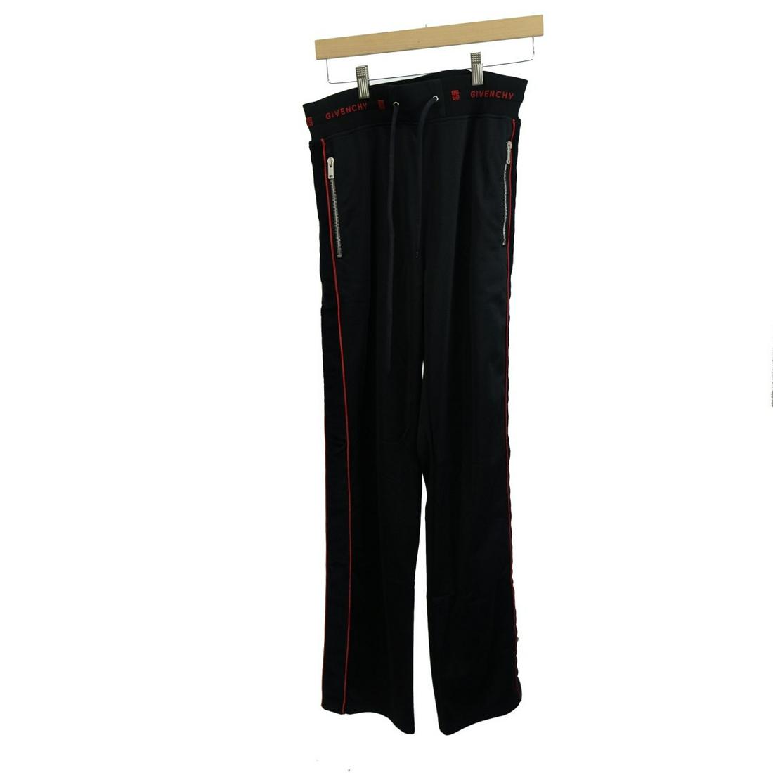 Givenchy Track Pants: Womens Givenchy Track Pants. Number: BW5086300P. Size: 38. Velvet trim, pockets with zipper, logo on elastic waistband. Composition: 100% polyester, 75% cotton, 25% polyester. 10% of the proceeds with
