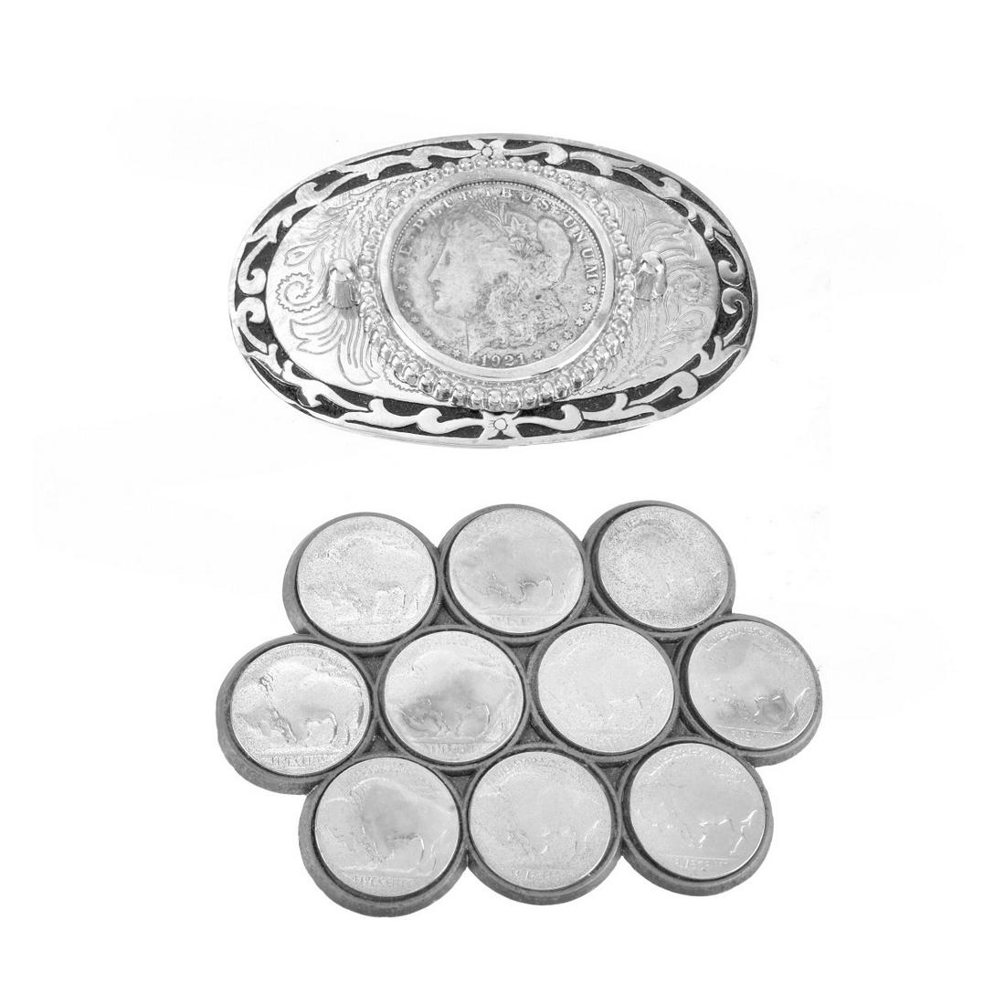 (2) Coin Mounted Belt Buckles: Grouping of Two (2) Coin Mounted Belt Buckles. Includes 1921 Morgan and 10 Buffalo nickels. Largest measures 3-3/4" x 2-1/2", other measures 2-1/4" x 2-1/2". Condition: Rubbing otherwise good conditio