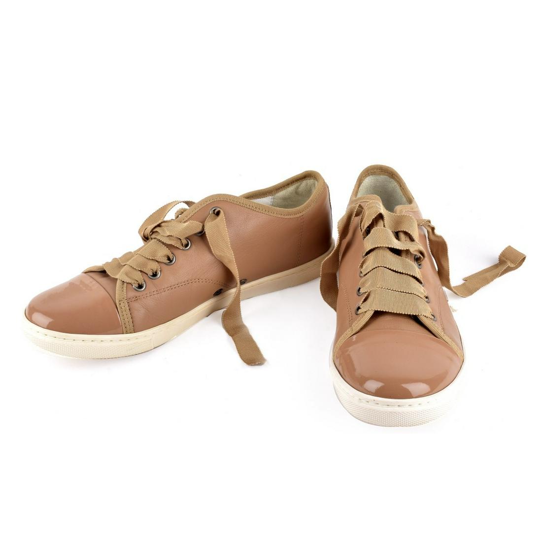 Womens Lanvin Sneakers: Womens Lanvin Low Top Sneakers. Appropriately labeled. Size: 38. Property of Ms Orianne Collins.10% of the proceeds with be donated to the Never Give Up Foundation. In help for children and adults wit