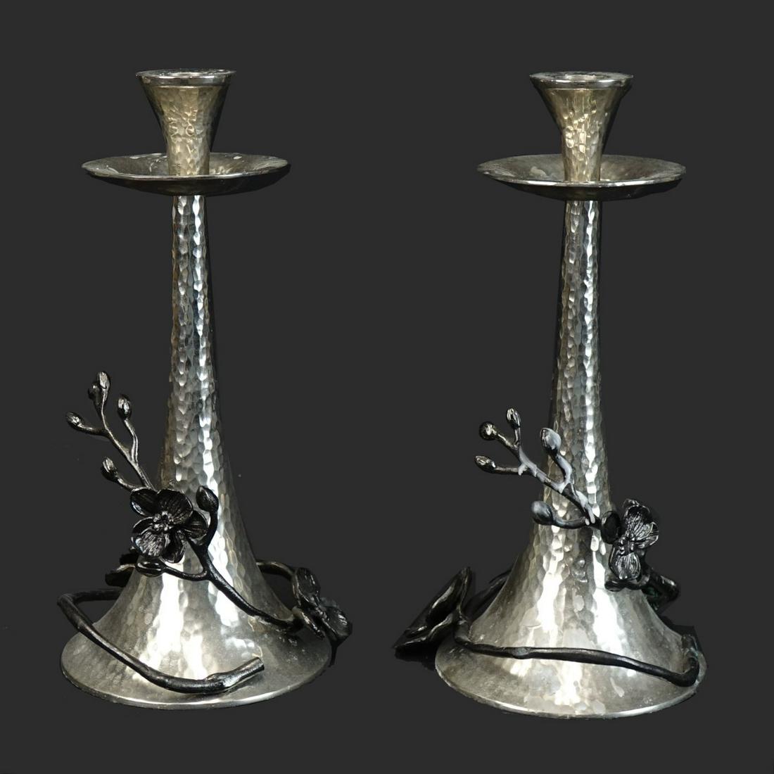 Michael Aram Candlesticks: Michael Aram White Orchid Nickleplate Candlesticks. Signed. Measures 11-1/4". Condition: Needs a routine cleaning otherwise good condition. Estimate: $100.00 - $300.00 Domestic Shipping: $72.00