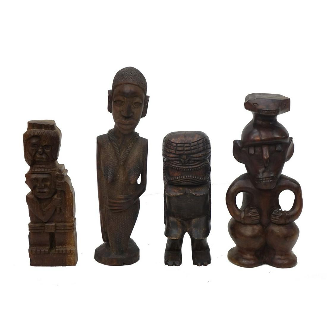 Tribal Sculptures: Grouping of Four (4) Antique and Vintage Assorted Hand Carved Tribal Sculptures. Lot consists of three African and one Polynesian. Tallest measures 18-1/4", smallest measures 12-1/4". Condition: Surfa